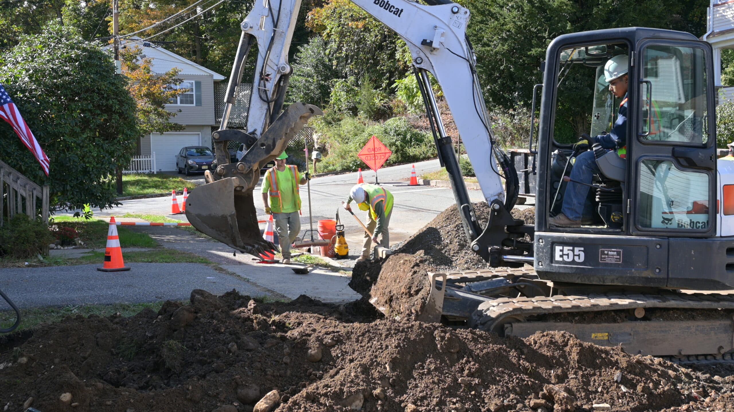 Sewer Line Replacement Expert in an Excavator