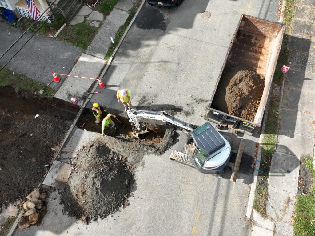Sewer line repair experts performing a sewer line repair service in Teaneck, NJ